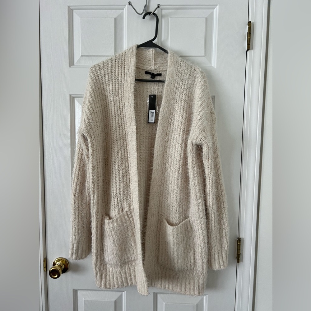 Cyrus sweater NWT